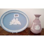 An oval wedgwood plaque & a purple wedgwood vase