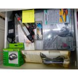 A drawer with unused Mini Craft tools, small vices etc