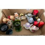 A box containing four miniature tea pots, various figures etc