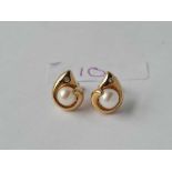 A pair of diamond set pearl earrings 18ct gold