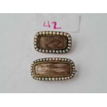 Two antique gold mounted pearl set mourning brooches