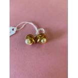 A pair of knot screw earrings 18ct gold
