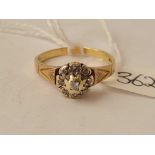 A diamond cluster 9ct ring size O