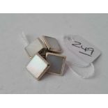 A Edwardian pair of white gold and MOP cufflinks 9ct