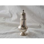 Baluster shape castor with plain finial to cover. 7 inch high. Birmingham 1930. 153gms