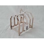 A larger toast rack on bracket feet - 3.75" wide - Birmingham 1936 - 85 g.