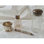 Silver mounted scent bottle, another bottle and a napkin ring