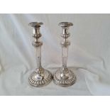 A large pair of George III candlesticks with detachable nozzles - 13" high - Sheffield 1807 by J