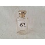 A silver mounted glass scent bottle - London 1916