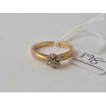 A diamond cluster ring 9ct size p - 3.2 gms