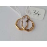 A small pair of 9ct hoop earrings 1g