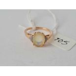 An opal single stone ring with diamond shoulders in 9ct size N ½ 2.2g inc