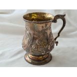 Victorian Exeter pint tankard embossed with flowers and scrolls. 5 inch high . 1872 By T S. 307gms