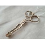 Pair of antique miniature scissor shaped sugar tongs. 2 inch long