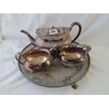 A Victorian salver with pierced border and a shaped tea set