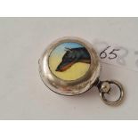 An antique plated enamel sovereign case depicting a Doberman Pincer dog