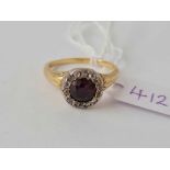 A GOOD EARLY VICTORIAN GARNET CLUSTER RING SET IN GOLD SIZE P - 4.6 GMS