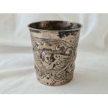 Antique continental beaker embossed with a winged angel. 3 inch high,maker I I S? 68gms