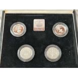 Boxed set of four 1983-1987 Piedfort £1 coins silver
