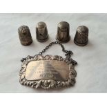 Inscribed wine label and four thimbles
