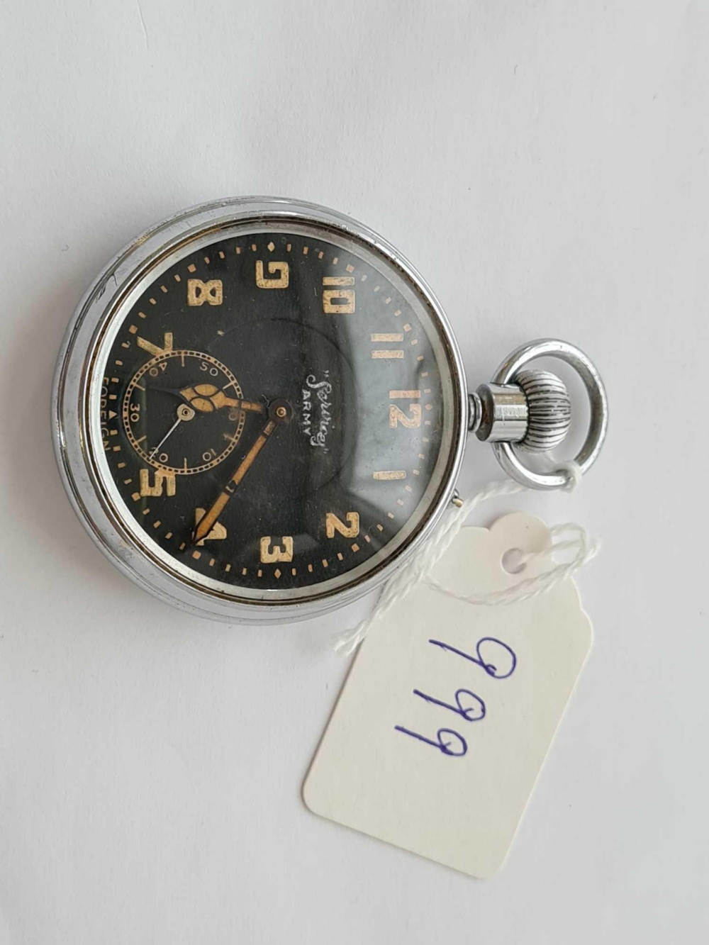 A gents pocket watch with black dial "Services Army" with seconds dial