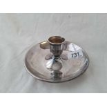 A Victorian candle holder with raised rim - 4.5" diameter - London 1888 - 120 g.