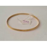 A 9ct gold bangle - 3.2 gms