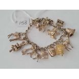 A silver charm bracelet 52g