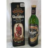 Bottle of Glenfiddich Scotch Whisky in metal case
