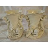 Pair of Dresden Cornucopia white vases with cherubs 7 inch high. Blue crossed swords mark