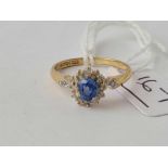 A 9ct blue stone cluster ring size M - 1.9 gms