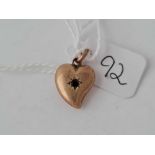 A small 9ct witches heart pendant (stone out)