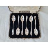 A boxed set of six coffee spoons by Walker & Hall