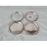 A set of four continental silver circular dishes - 3" diameter - 102 g.