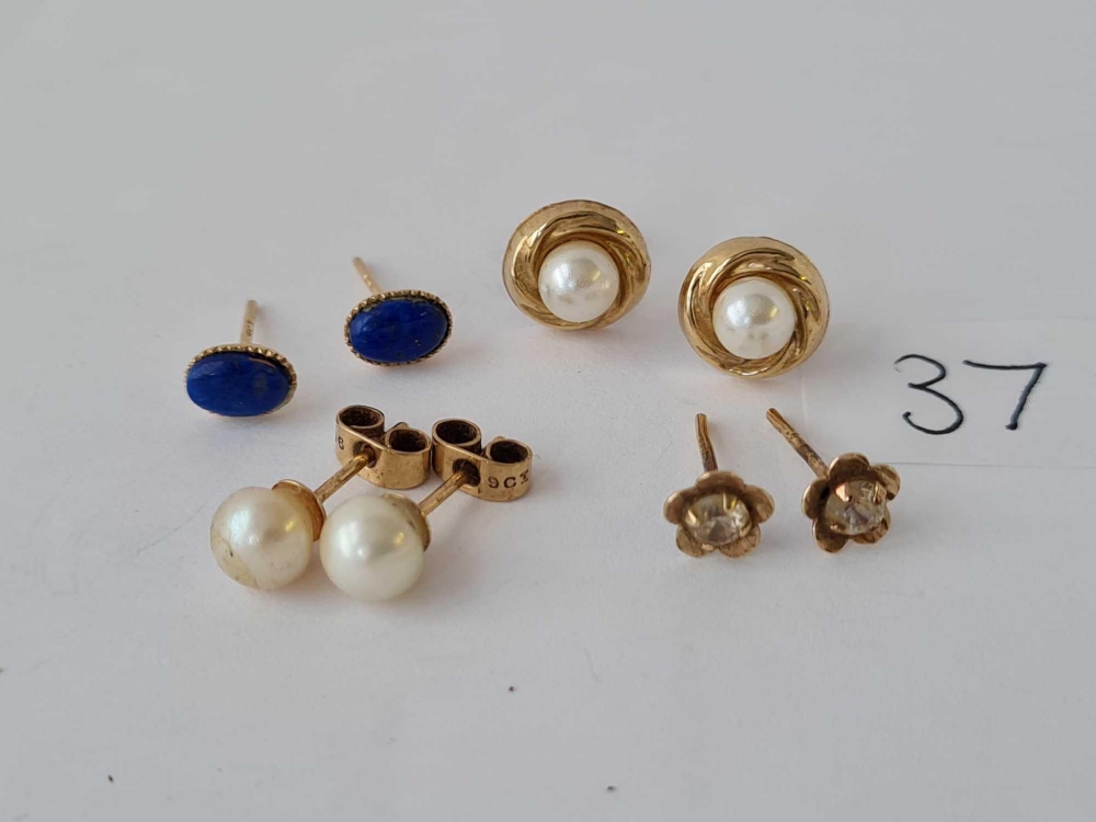 Four pair of 9ct ear studs