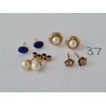 Four pair of 9ct ear studs