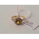 A EDWARDIAN YELLOW SAPPHIRE AND DIAMOND CLUSTER RING 18CT GOLD SIZE J1/2 - 2.8 GMS