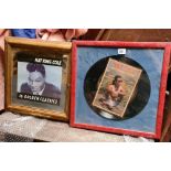A framed record named King & Nat King Cole picture cover
