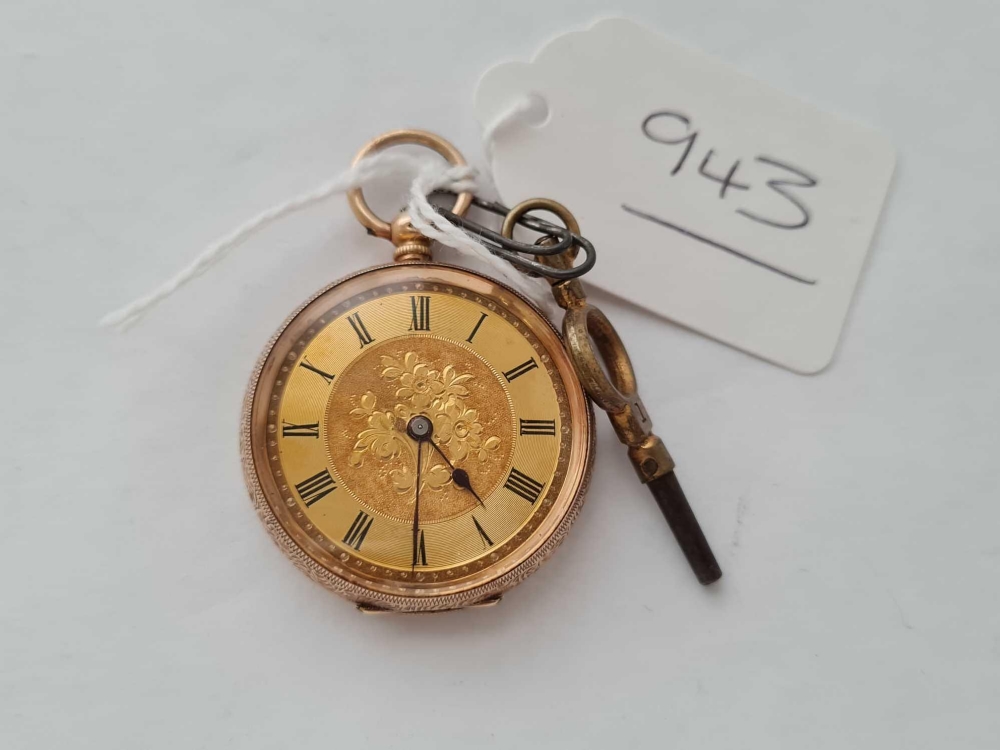 A ladies fob watch, complete with key in 14 ct gold