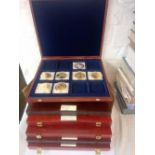 6x Cased sets of commemorative coins