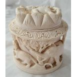 Good carved jar and cover decorated with elephant tiger etc. 4 inch wide