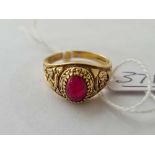 An ornate oval garnet ring 9ct size W - 5.6 gms