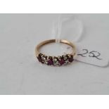 A garnet and diamond 9ct dress ring size M