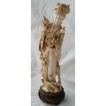 High quality carved Chinese figure of a Chinese girl with flowers. 10 inch excl plinth