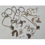 Fourteen assorted silver chains - 63 gms