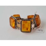 a silver and reconstituted amber bracelet