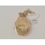 A large engraved silver locket necklace - 25.7 gms