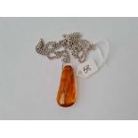 A large amber pendant on silver neck chain 15.6g inc