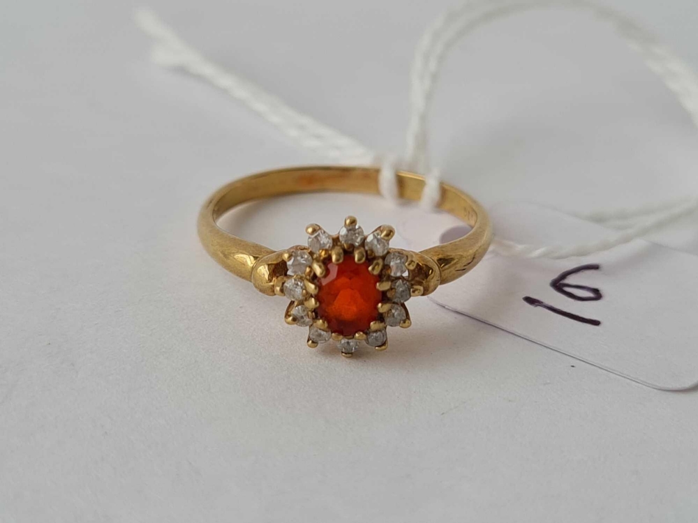 A 9ct red stone cluster ring size O