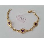 An amethyst 9ct fancy panel bracelet 4.1g inc